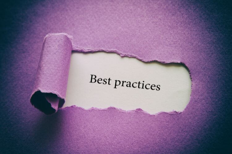 A piece of purple paper reveals the text "Best practices" on a white background.