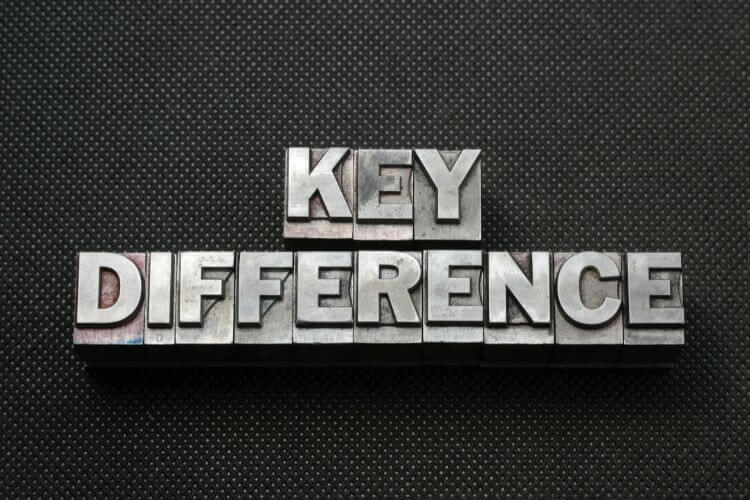 The words 'KEY DIFFERENCE' are displayed in metallic letterpress type on a textured black surface