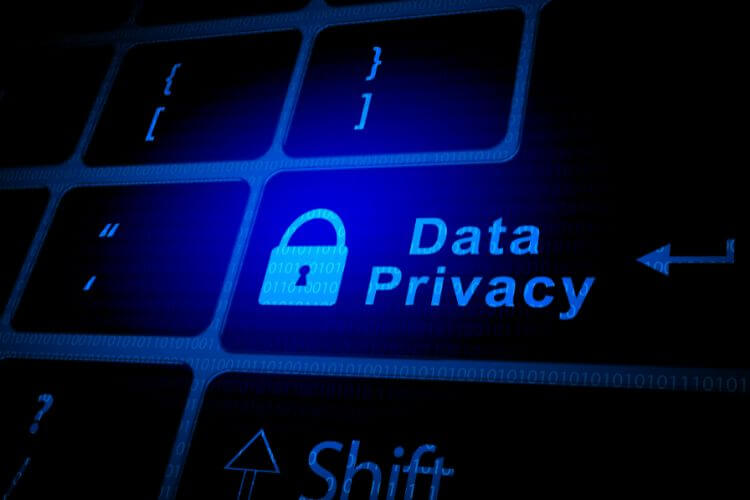 Blue keyboard with highlighted 'Data Privacy' button symbolizing digital marketing ethics and security