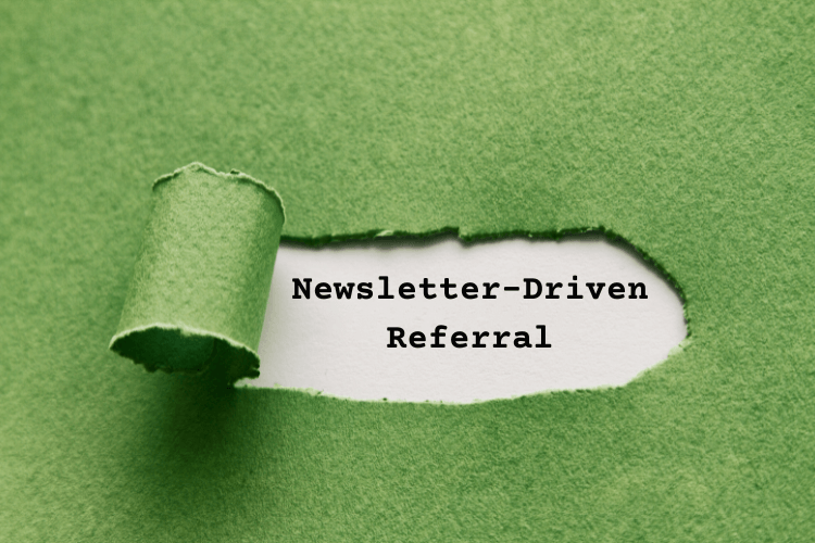 Green paper tear revealing 'Newsletter-Driven Referral' text, symbolizing organic loyalty through emails