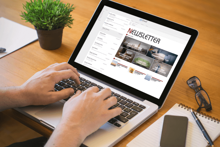 Laptop displaying newsletter content, symbolizing how email nurtures loyalty and increases retention rates