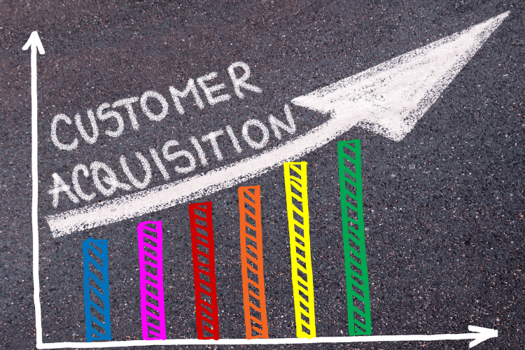 Chalk-drawn graph showing rising customer acquisition metrics with colorful bar chart and arrow.