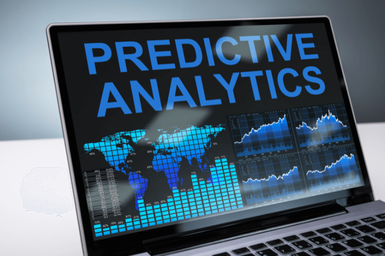 Laptop screen displaying predictive analytics dashboards, charts, and global data visualizations.