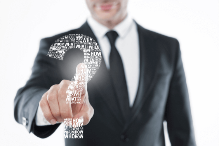 Businessman touching digital question mark symbolizing CMO curiosity about Chrome extensions in 2025