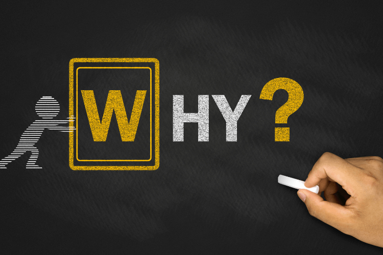 Handwriting the word “WHY” on chalkboard illustrating decision-making behind choosing graph or vector databases