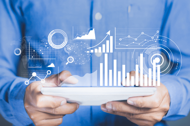 Businessman using tablet with analytics and AI-driven social media metrics