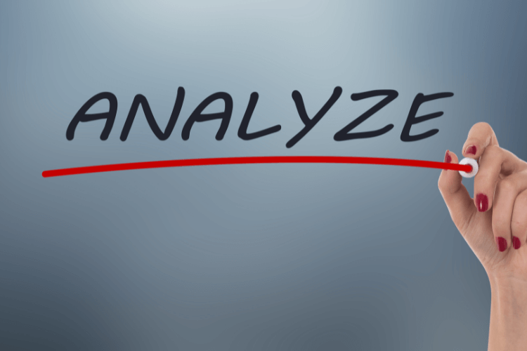 Hand writing Analyze with underline for data insights and business intelligence.